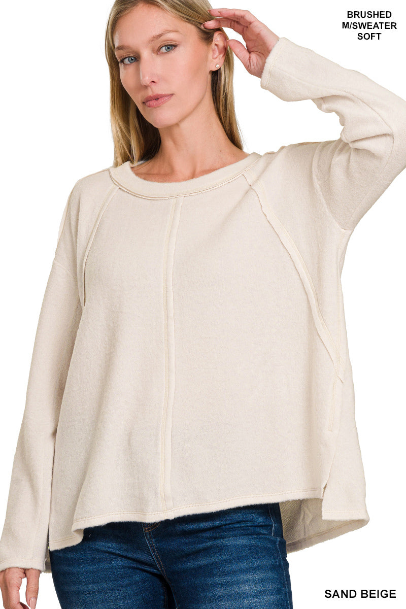 BRUSHED HACCI EXPOSED SEAM HI LOW SWEATER